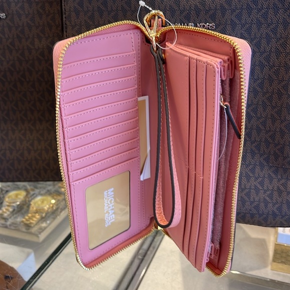 MICHAEL KORS
Leather Continental Wristlet Phone Case Wallet 
Primrose 
NWT - Picture 9 of 16